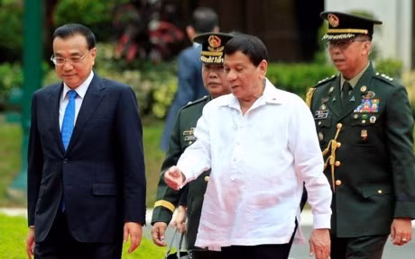 La Chine et les Philippines signent 14 conventions de coopération ảnh 1