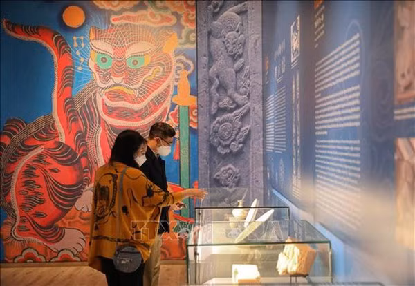 Dans l’art ancien du Vietnam, les tigres majestueux mais accessibles ảnh 3