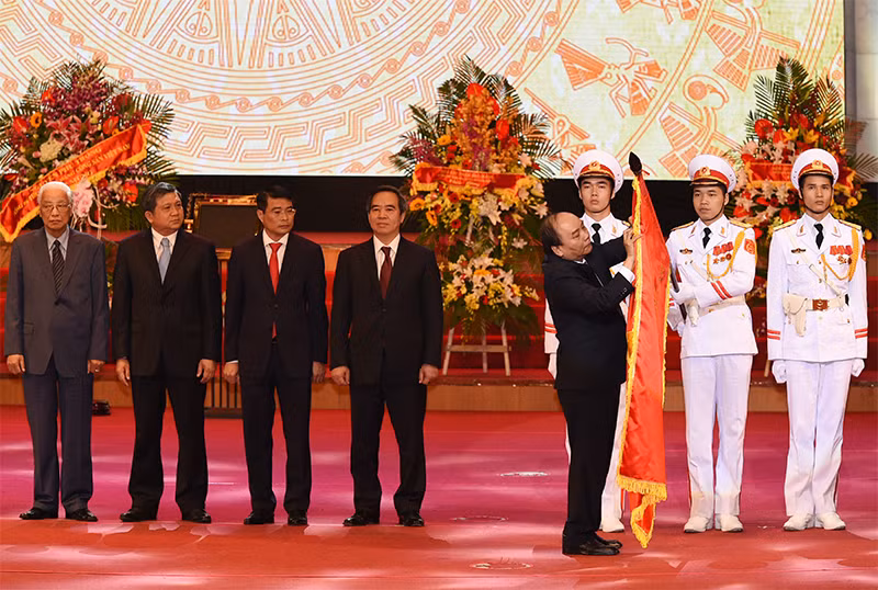 Célébration du 65e anniversaire de la fondation de la Banque d’Etat ảnh 1