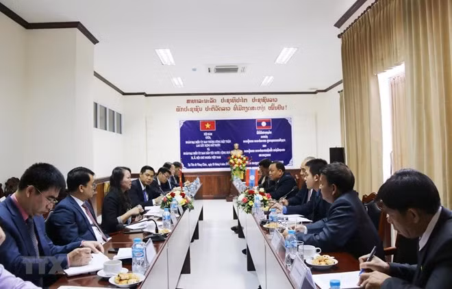 Le Vietnam et le Laos renforcent leur coopération dans les affaires ethniques ảnh 1