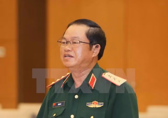 Visite officielle d’une délégation militaire vietnamienne au Laos ảnh 1