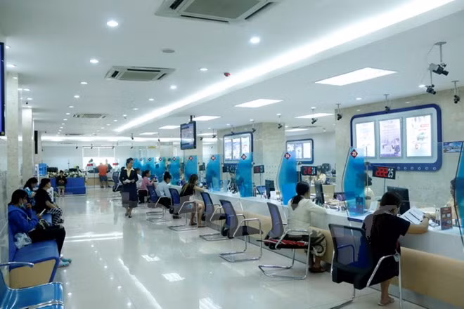 Le Vietnam contribue activement au développement socio-économique du Laos ảnh 1