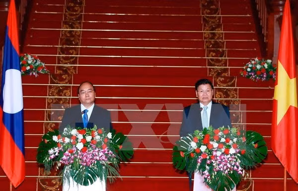 Efforts communs pour approfondir les liens Vietnam-Laos ảnh 1