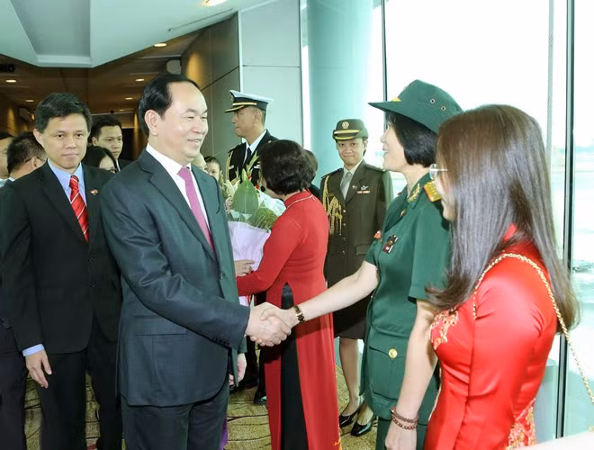 Le président Tran Dai Quang entame sa visite d'Etat à Singapour ảnh 1