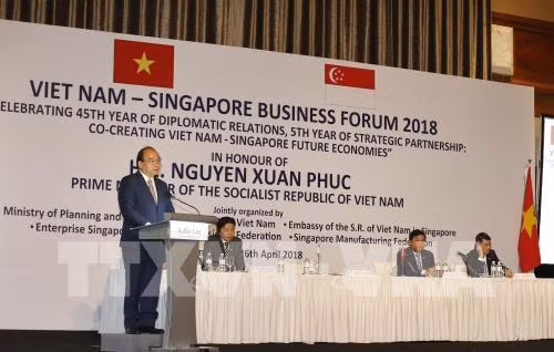 Le PM invite à intensifier les liens économiques Vietnam-Singapour ảnh 2