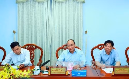 Le PM exhorte An Giang à élever la valeur ajoutée des produits agricoles ảnh 1