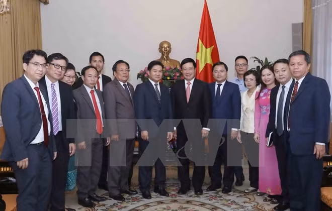 Le vice-PM Pham Binh Minh reçoit la délégation de l’Union de la jeunsse du Laos ảnh 1
