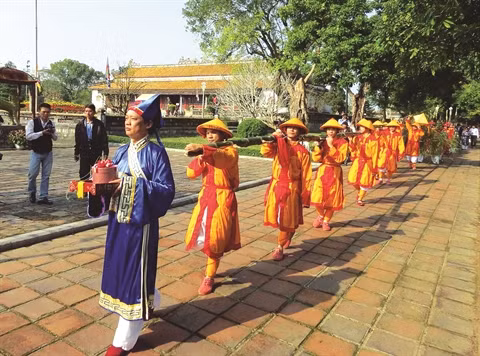 Le mât rituel, protecteur de la famille durant le Têt ảnh 2