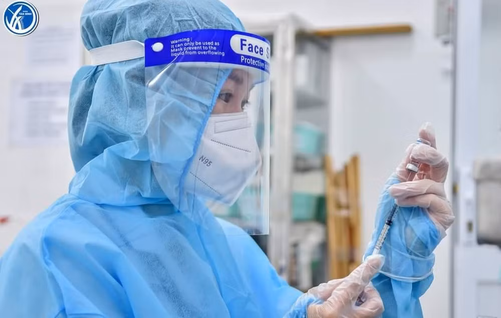 HCM-Ville prévoit d'administrer la 3e dose de vaccin contre le COVID-19 à partir du 10 décembre ảnh 1