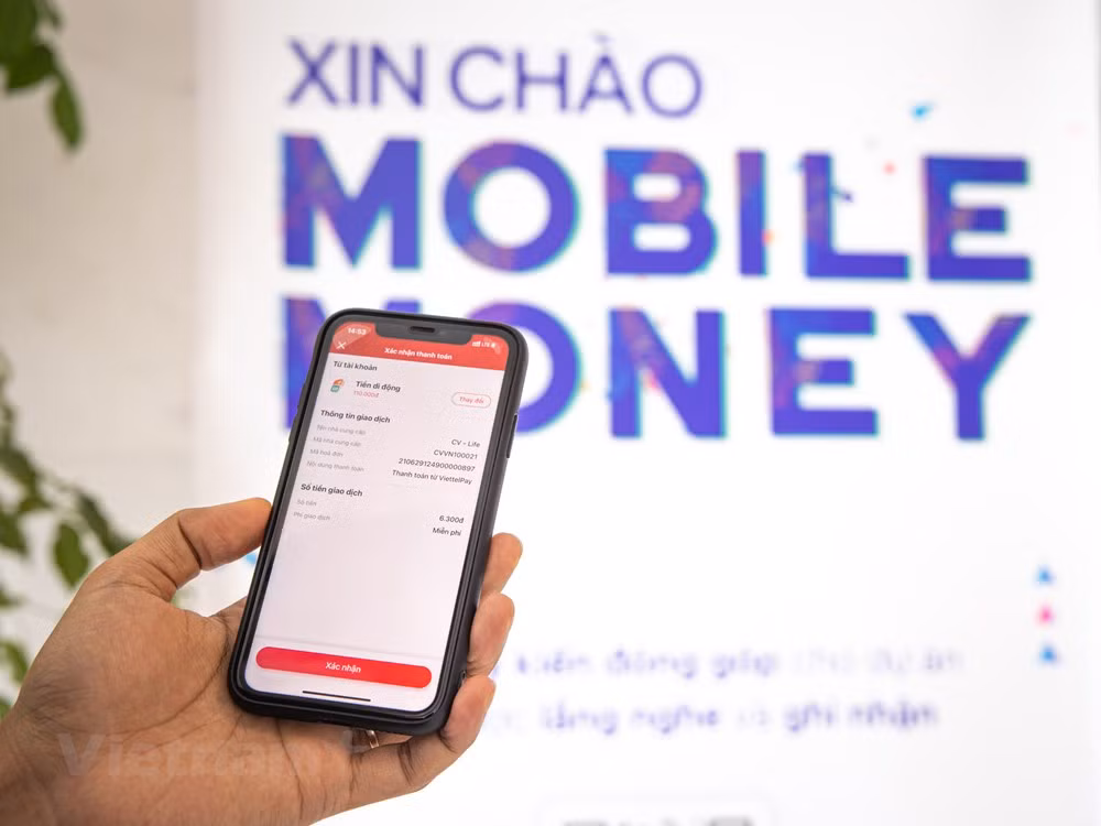 Mise en fonctionnement à titre expérimental du service Mobile Money au Vietnam ảnh 1