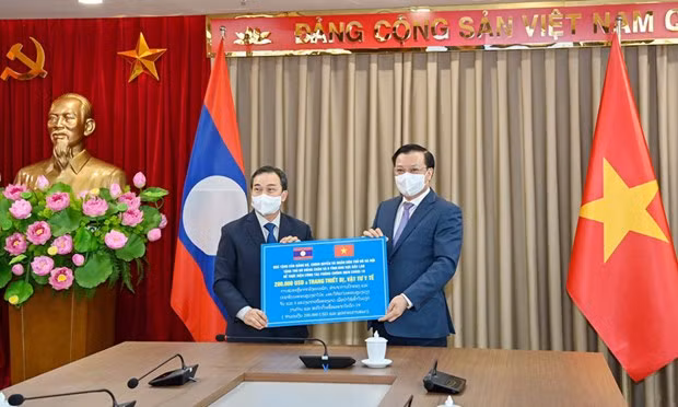 La capitale Hanoï et le Laos favorisent une coopération multiforme ảnh 1