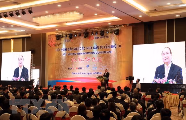 Nguyen Xuan Phuc à la conférence « Rencontre des investisseurs dans la province de Nghe An » ảnh 1