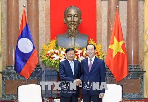 Le président Trân Dai Quang reçoit le Premier ministre laotien Thongloun Sisoulith ảnh 1