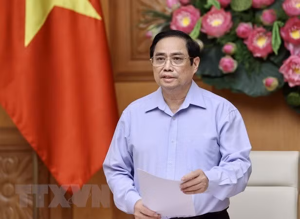 Le PM encourage les gens à être plus actifs dans le combat contre le coronavirus ảnh 1