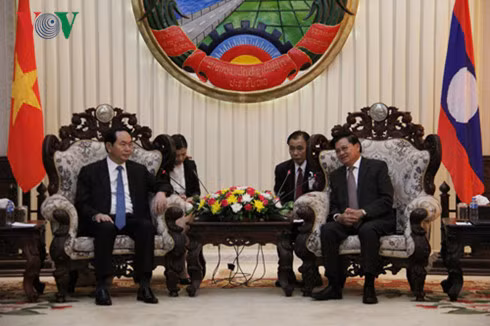 Le président Trân Dai Quang rencontre le PM et la présidente de l'AN du Laos ảnh 1