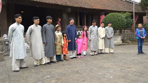 À propos de la modernisation de l’áo dài, la tunique traditionnelle vietnamienne ảnh 1