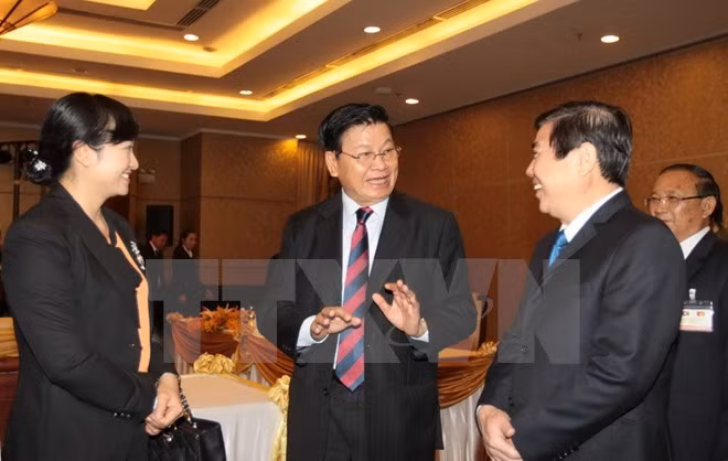 Le Premier ministre laotien termine sa visite au Vietnam ảnh 1