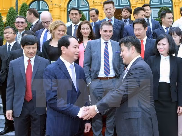 Le chef de l’État vietnamien reçoit une délégation d’entreprises internationales ảnh 1