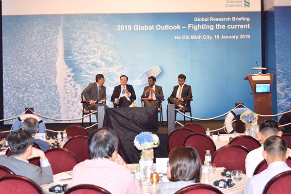 Standard Chartered prédit une croissance stable pour le Vietnam en 2019 ảnh 1
