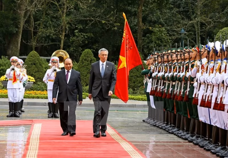 Le Premier ministre singapourien Lee Hsien Loong termine sa visite au Vietnam ảnh 1