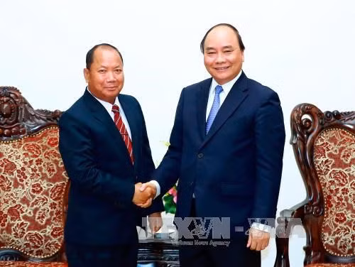 Promouvoir la coopération entre les ministères vietnamien et laotien de la Sécurité publique ảnh 1