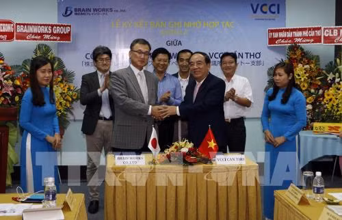 Signature d'un mémorandum de coopération commerciale Vietnam-Japon ảnh 1