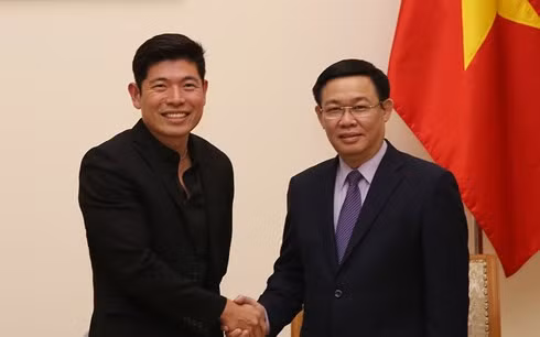 Le vice-PM Vuong Dinh Huê reçoit le directeur exécutif de Grab Anthony Tan ảnh 1