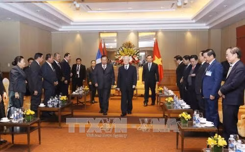 Le secrétaire général du Parti et président du Laos termine sa visite officielle d’amitié au Vietnam ảnh 1