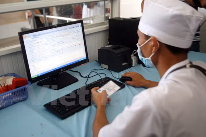 VNPT présente son système d'information de la santé à Singapour ảnh 1