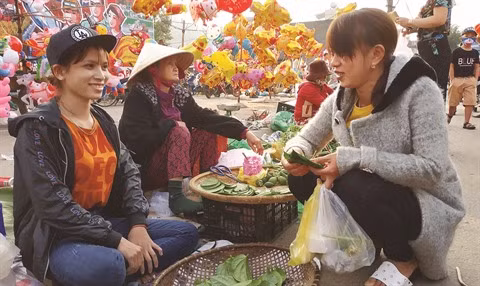 Cho Gò, le marché qui se tient uniquement le Jour de l’An ảnh 1