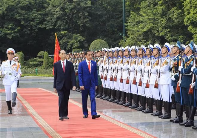 Cérémonie d’accueil en l’honneur du président indonésien Joko Widodo ảnh 1