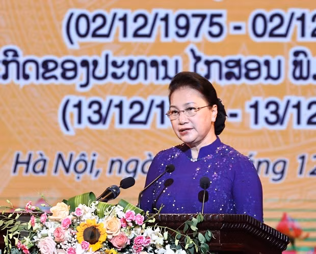 Une cérémonie solennelle en l’honneur de la Fête nationale du Laos ảnh 1
