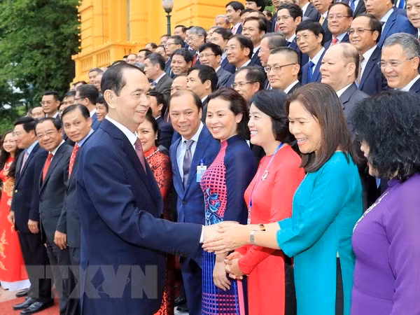 Le président Tran Dai Quang rencontre des diplomates vietnamiens ảnh 1
