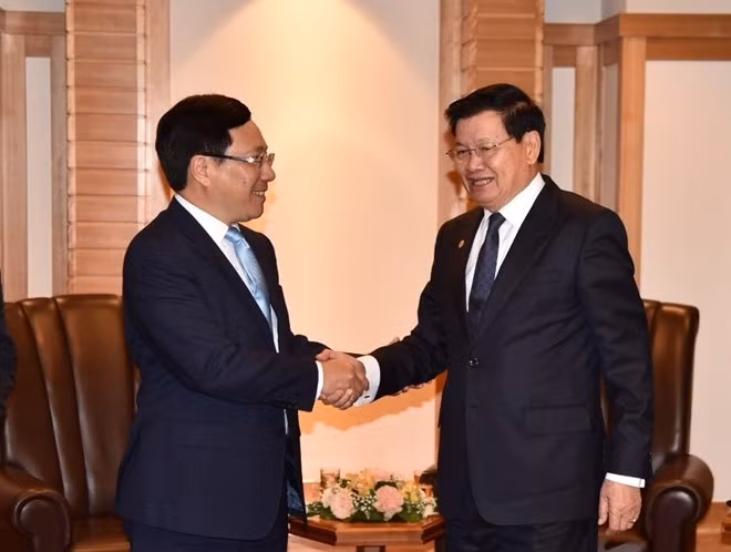 Le vice-PM Pham Binh Minh rencontre des dirigeants japonais et laotien à Tokyo ảnh 2