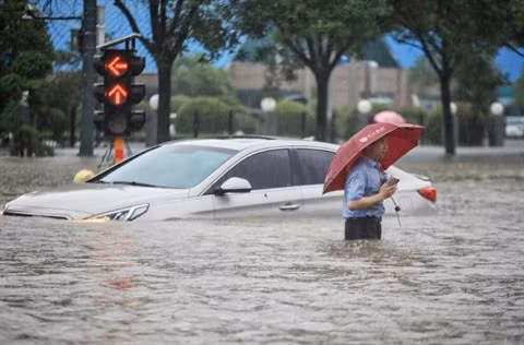 Inondations en Chine: message de sympathie du Vietnam ảnh 1