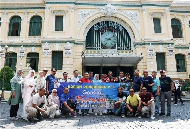 Des touristes étrangers à Hô Chi Minh-Ville