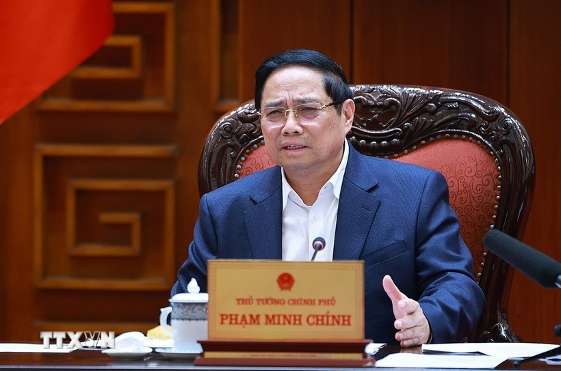 Le Premier ministre Pham Minh Chinh s'exprime lors de la réunion. Photo: VNA