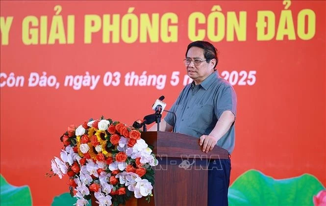 Le Premier ministre Pham Minh Chinh s'exprime lors de la rencontre. Photo: VNA