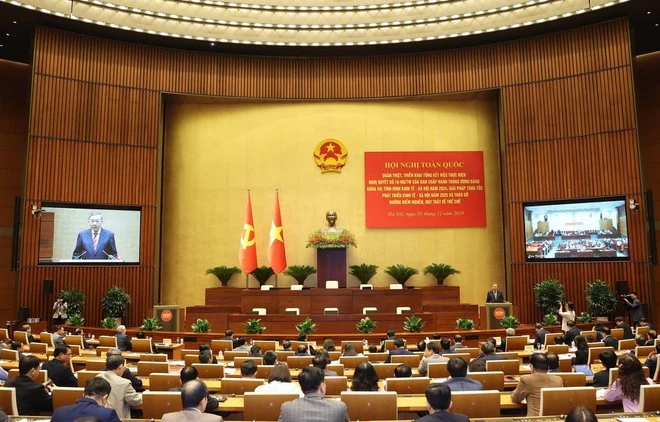 Conférence nationale pour faire le bilan de la mise en œuvre de la Résolution n°18-NQ/TW du 12e Comité central du Parti. Photo: VNA