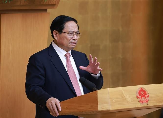 Le Premier ministre Pham Minh Chinh, chef du Comité national de pilotage des ouvrages et projets clés du secteur des transports, s'exprime lors de la réunion. Photo: VNA