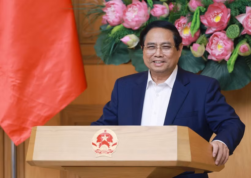 Le Premier ministre Pham Minh Chinh s'exprime lors de la réunion. Photo: VNA