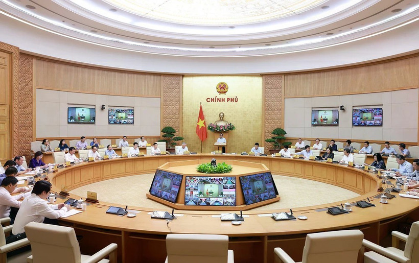 Le Premier ministre Pham Minh Chinh préside une visioconférence avec 34 localités. Photo: VNA