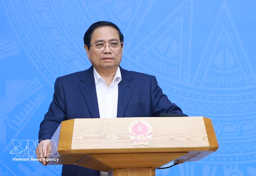 Le Premier ministre Pham Minh Chinh s'exprime lors de la conférence. Photo: VNA