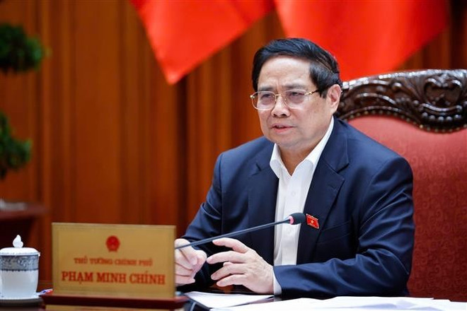 Le Premier ministre Pham Minh Chinh salue les efforts conjoints des ministères, organes, agences et localités concernés dans la préparation et la conduite des négociations. Photo : VNA vna-potal-thu-tuong-chu-tri-hop-chuan-bi-dam-phan-thuong-mai-voi-hoa-ky-ngay-245-8051726.jpg
