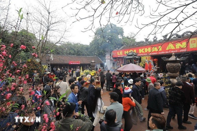 La fête de l'ouverture des sceaux du temple des rois Trân à Nam Dinh, l’une des fêtes printanières incontournables du Nord. Photo : VNA 0502-le-hoi-khai-an-den-tran.jpg