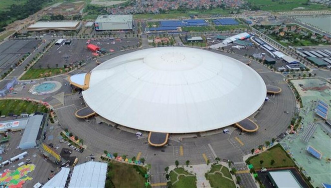 Le Centre national des expositions qui s’étend sur plusieurs centaines de milliers de mètres carrés aux normes internationales est appelé à devenir le nouvel emblème de la capitale, Hanoï, avec pour point d’orgue le gigantesque hall Kim Quy à l'image de la tortue. Photo : VNA/CVN 152145-vna-potal-khanh-thanh-trung-tam-hoi-cho-trien-lam-quoc-gia-vec-8219713.jpg