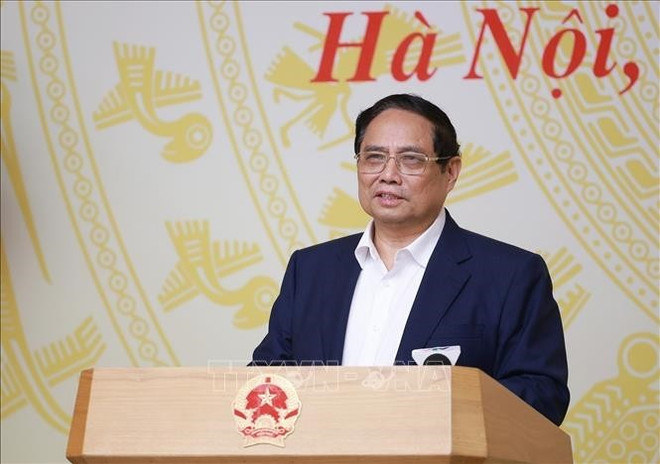 Le Premier ministre Pham Minh Chinh s'exprime lors de la conférence. Photo : VNA kl1.jpg