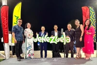 Des représentants d'agences de voyages vietnamiennes participent à la 18ᵉ Foire internationale du tourisme (FITVEN 2025). Photo: VNA