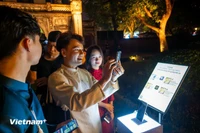 La technologie numérique permet aux touristes de vivre des expériences plus passionnantes. Photo : Vietnam+