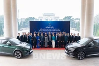 Les délégués à la cérémonie de signature de l'accord de coopération. Photo: VNA